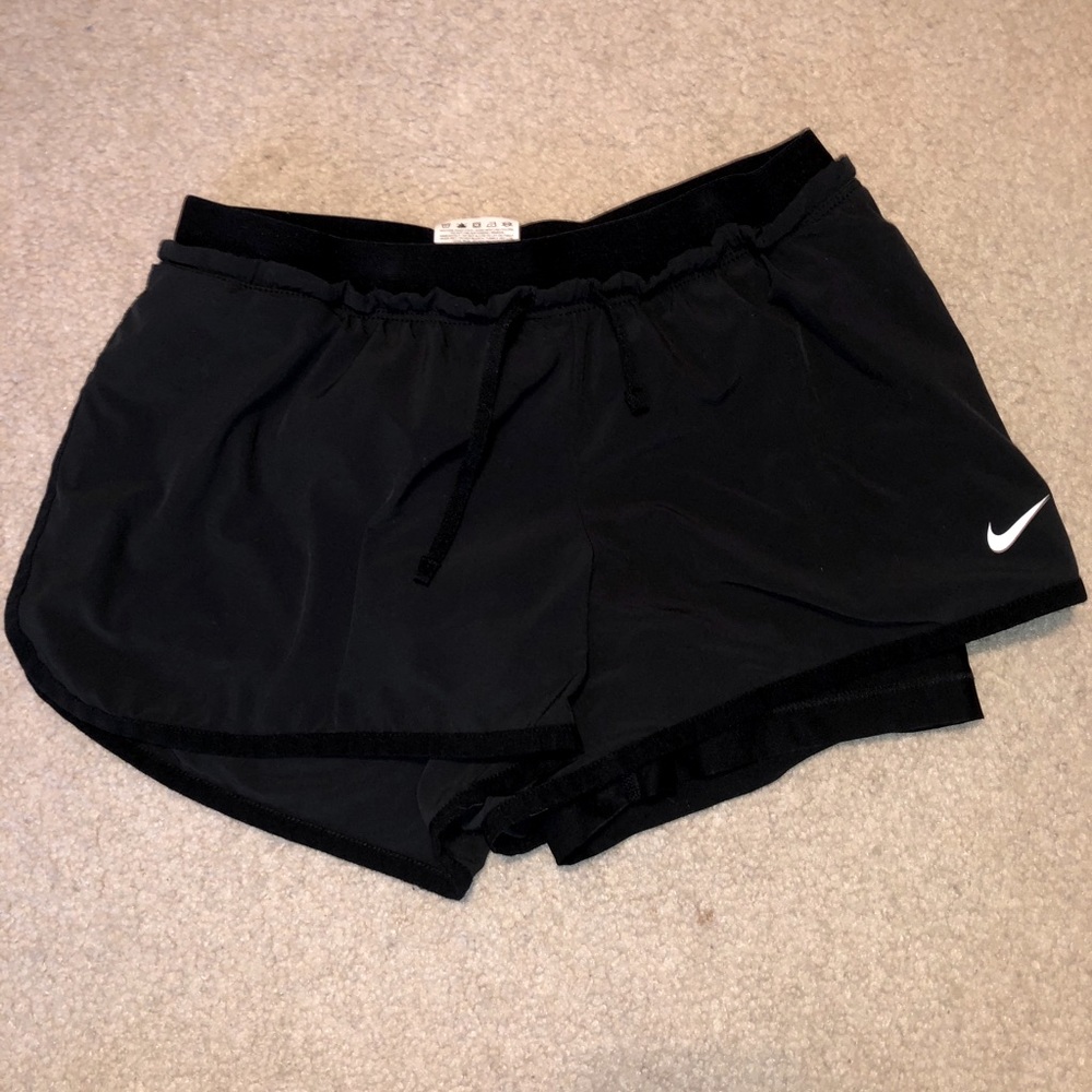 Black Nike shorts with spandex, size S